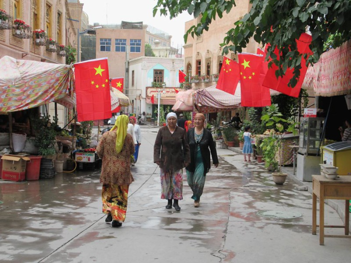 Uighurs walking street