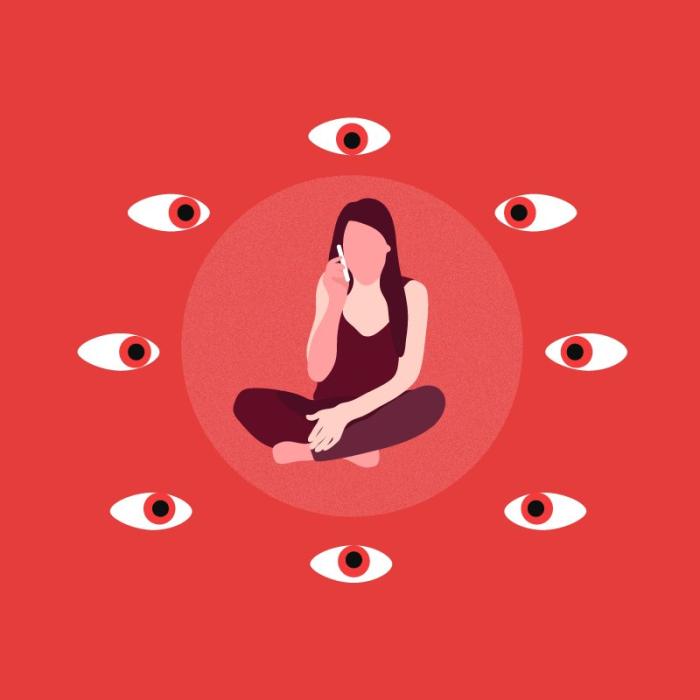 Woman on the phone surrounded by eyes watching