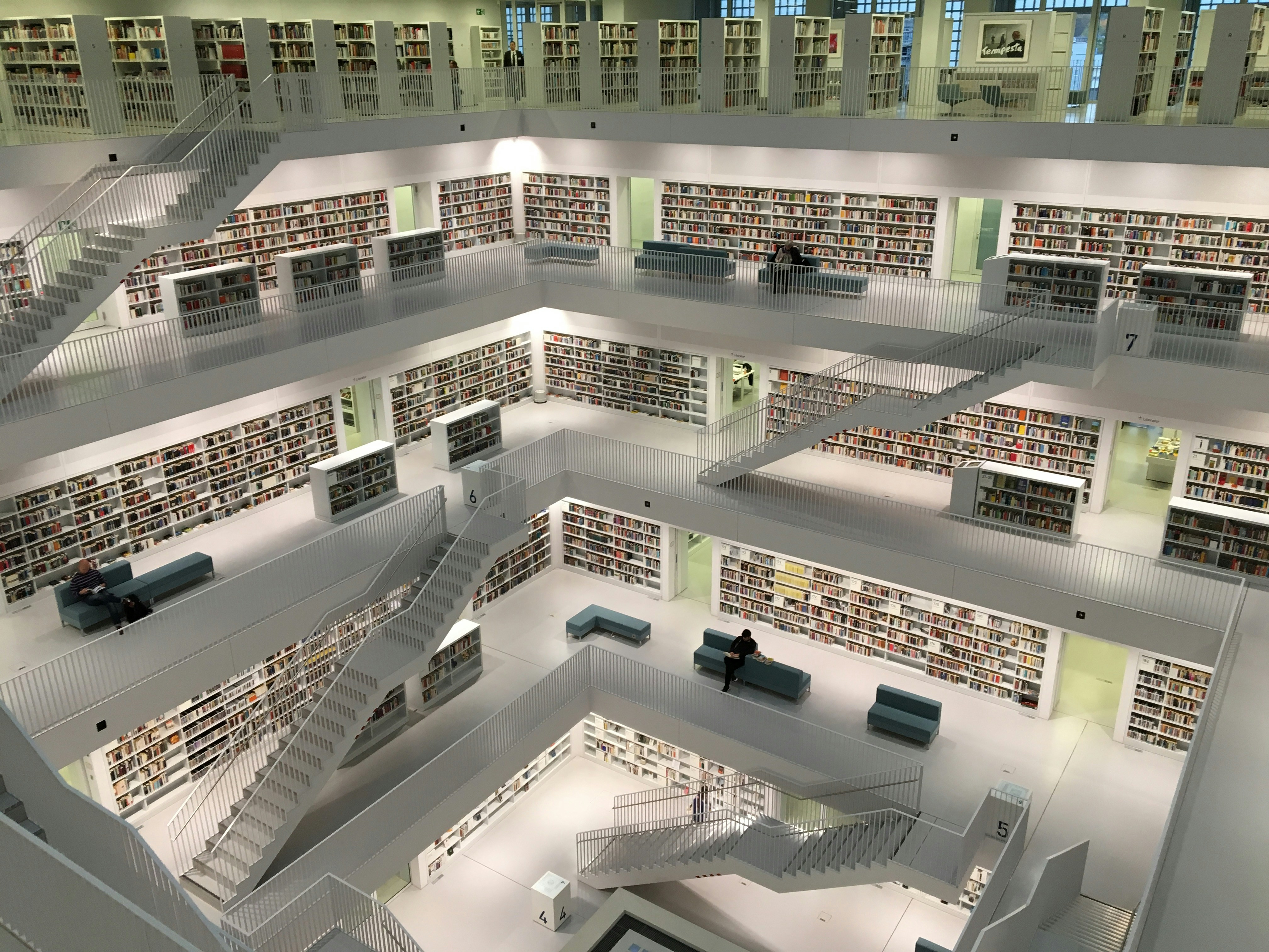 Photo of the open hall of a library on multiple floors