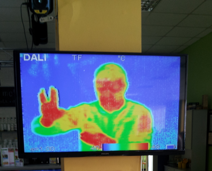 multicoloured image showing a thermographic image of one person