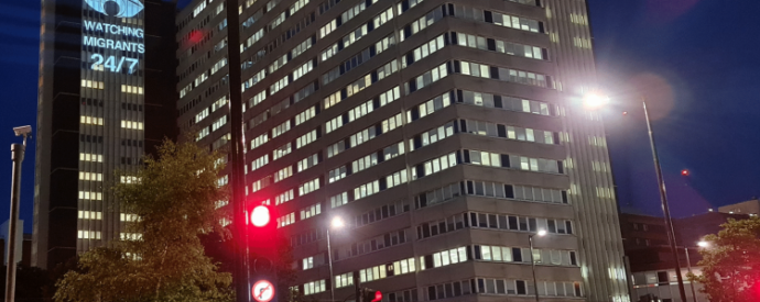 Watching Migrants 24/7 Projected on Lunar House 