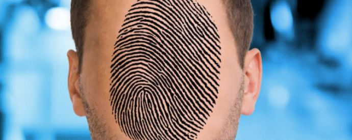 Close up of individual's face with fingerprint replacing facial features