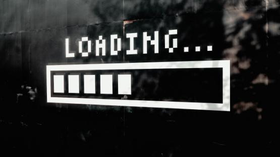 A mural of a white loading bar on black background