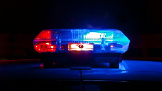 A police siren on a dark background