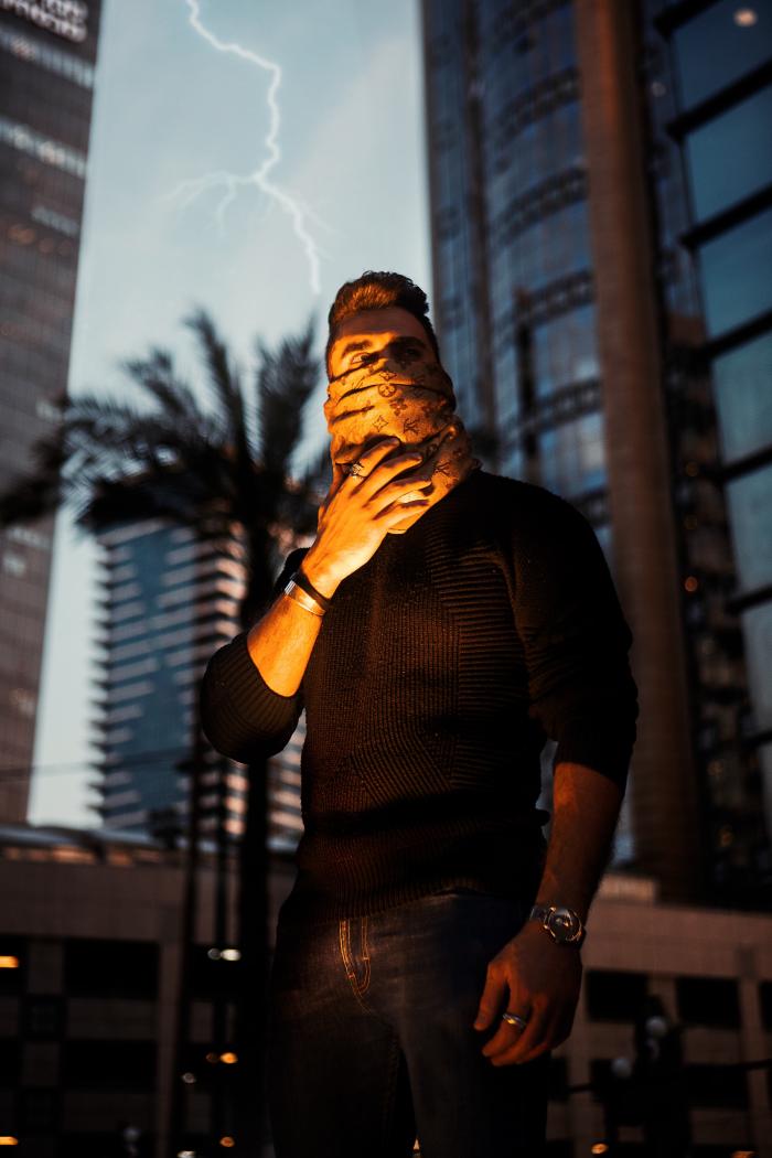 Man in Tel Aviv covering his face covid 19 in Israel