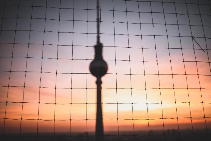 Berlin TV tower behind a net