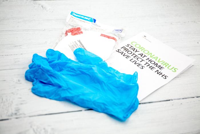 UK government leaflet that reads 'Stay Home Protect The NHS'
