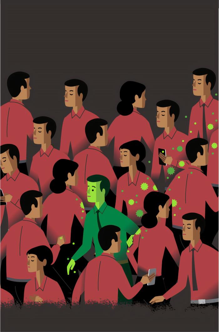 Crowd of people in red with one in green