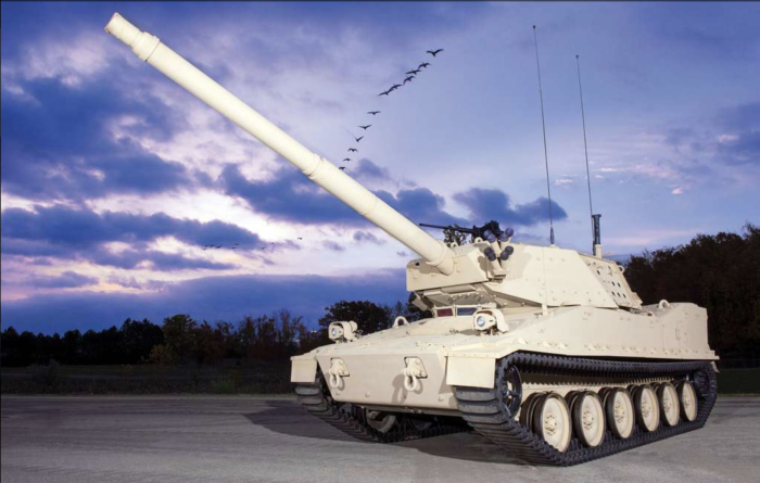 a tank is displayed against a sunset