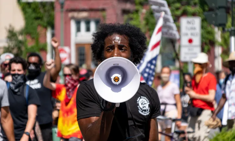 Protestor with microphone in Syracuse October 2020