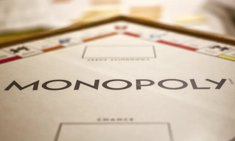 Close up image of text on Monoply board game