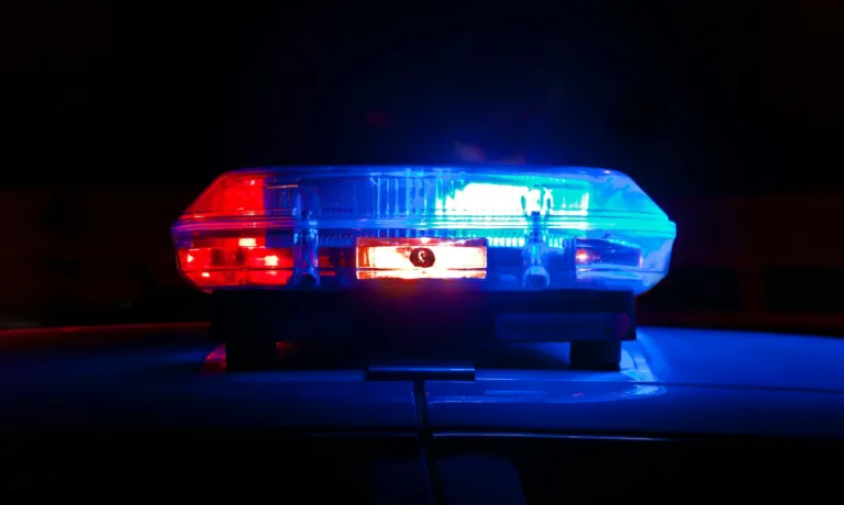 A police siren on a dark background