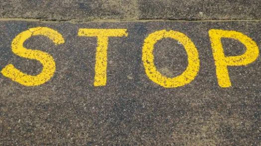 stop sign on pavement