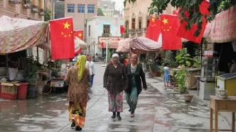 Uighurs walking street