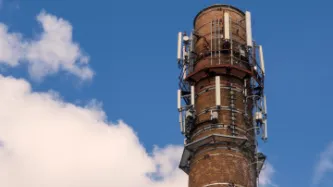 Factory chimney with mobile phone antennas