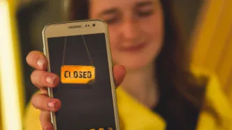 Smart phone with 'closed' label on screen